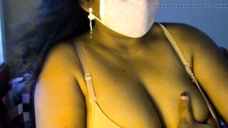 Hot romantic sexy big boobs girl being a Desi girl does self sex, opens her bra, presses her boobs and pulls her nipples.