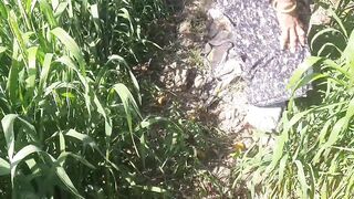 The native daughter-in-law of the village shows her beautiful son-in-law in the open air on the farm, shows her backyard, her slim waist, her tightness in the forest of the open field. - 2 image