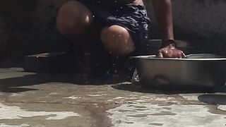 Desi sister-in-law is taking a bath in an open bathroom near the road on the edge of the forest on the farm - 11 image