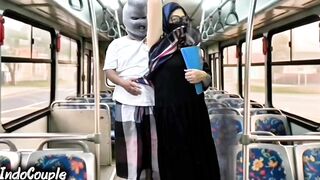 Muslim wife gets wild in a public bus with stranger - hijab-clad face and pussy included!